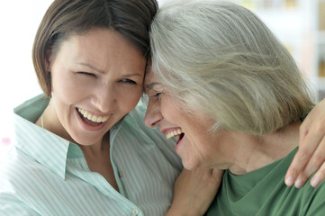 Portrait of  Senior woman with daughter at home