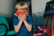 © Olga Moreira/Stocksy - Kid cleaning his face with a napkin