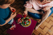 © Olga Moreira/Stocksy - Mother and her son eating strawberries