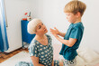 © Olga Moreira/Stocksy - Mom listening her 5 years old son while sitting in bed