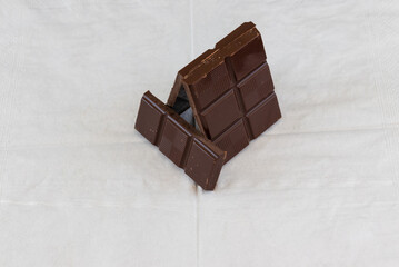 Canvas Print - Closeup shot of chocolate bars on a white surface