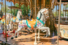 Parisian-style Merry-go-round With The Horses In The Foreground.