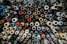 Closeup Of Rolls Of Colorful Textile And Fabric For Roller Blinds In A Factory.