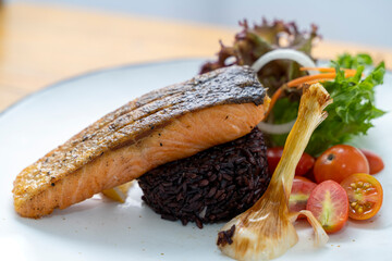 Wall Mural - Salmon Don, Fusion Food. Braised grilled salmon with black rice.