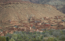 Mudbrick Village Built In The Side Of The Hill In The High Atlas Mountains