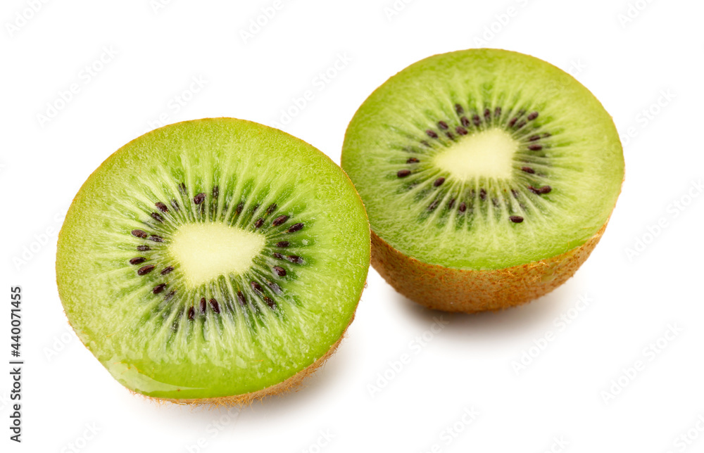 Cut ripe kiwi on white background