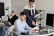 © Pixel-Shot - Team of accountants working in office