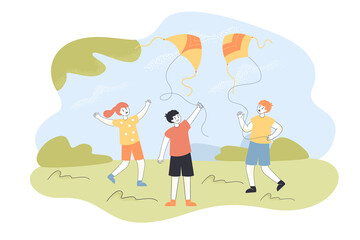 Kids flying kites outside. Boys playing with air or wind toys on string on walk flat vector illustration. Outdoor activity or games, childhood concept for banner, website design or landing web page