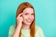 © deagreez - Photo of cheerful young positive woman point finger head think smile isolated on pastel teal color background