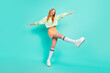 © deagreez - Full body photo of crazy millennial lady fly wear sport clothes skirt shoes isolated on teal color background