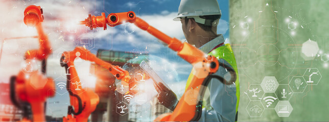Wall Mural - industry engineer construction,using smart tablet,control automation robot arm machine intelligence 