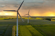 Wind turbines that produce electricity, built on a field in Skanderborg, Denmark	
