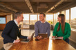 © Annika List/Westend61 - Entrepreneurs smiling while working together in meeting