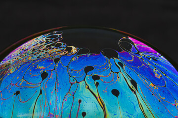 beautiful psychedelic abstractions on the surface soap bubbles