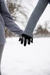 © Frank van Delft/Westend61 - Senior couple wearing gloves while holding hands during winter