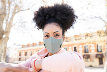 Woman wearing protective face mask during pandemic