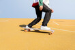 © Jose Carlos Ichiro/Westend61 - Young man riding skateboard on sports court