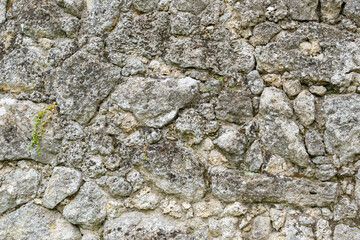 Canvas Print - Closeup shot of a stone wall background