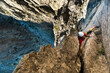 © Manu Prats/Westend61 - Determined male climber climbing rock mountain