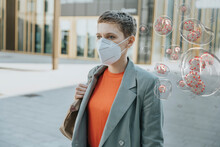 Woman Wearing Face Mask In The City To Protect Herself From Corona Viruses