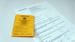 Yellow vaccination certificate with anamnesis sheet