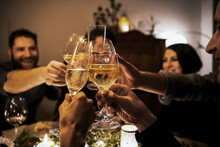 Cheerful Friends Raising Toasts During Birthday Celebration At Home