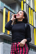 © NOVELLIMAGE/Westend61 - Happy woman looking away while talking on mobile phone