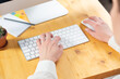 © Nana_studio - Businesswoman typing on computer keyboard at workplace Woman working in home office hand keyboard