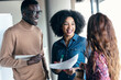 © JOSEP SURIA/Westend61 - Happy business people discussing at office
