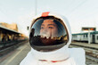 © Eugenio Marongiu/Westend61 - Thoughtful female astronaut in space helmet looking away during sunset