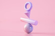 © George J/Westend61 - 3D illustration of pink and purple balancing shapes