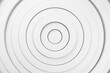 © George J/Westend61 - Three dimensional background of white overlapping rings