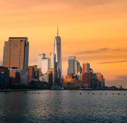 Wall Mural - city skyline at sunset Manhattan New York panorama travel sea urban buildings sky color orange 