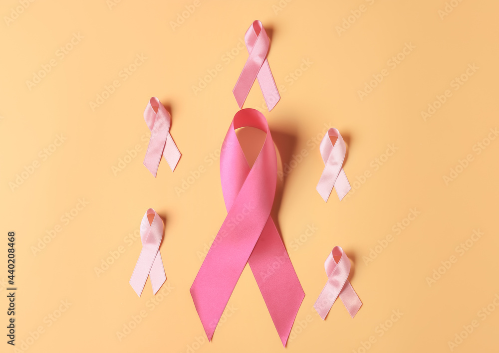 Pink ribbons on color background. Breast cancer concept