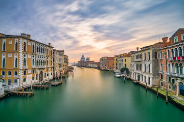 Wall Mural - Grand Canal and Basilica Santa Maria della Salute at sunrise in Venice, Italy