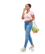 © Syda Productions - sustainability, food shopping and eco living concept - happy smiling african american woman with reusable string bag with fruits and vegetables calling on smartphone and walking over white background