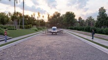 The Passenger Air Taxi Takes Off And Departs To Its Destination. View Of An Unmanned Aerial Passenger Vehicle. 3D Rendering.