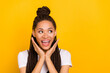© deagreez - Portrait of attractive amazed cheerful girl thinking having fun copy space isolated over bright yellow color background