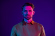 © deagreez - Photo of serious young cool charming attractive man wear casual outfit club isolated on neon background
