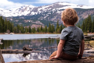 child on the lake