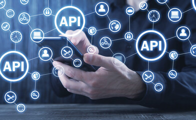 Sticker - man holding smartphone. api. application programming interface. software development. technology