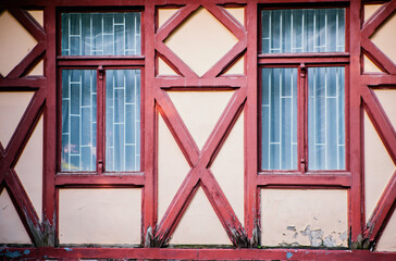 Background of a building wall with wood paneling. Geometric shapes. Modern architecture and design.