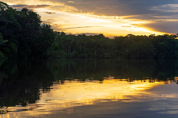Wall Mural - Amazon river rainforest sunset, Yasuni national park, Ecuador.