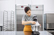 © Anischenko - Pastry chef girl prepares fresh cakes at her small production facility