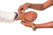 © Dip Photography - Indian festival Raksha Bandhan, Raakhi on hand, Sister tie Rakhi as symbol of intense love for her brother.