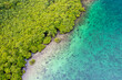 © Curioso.Photography - Tropical Island Aerial View. Wild coastline lush exotic green jungle. Red Frog Beach in Bastimentos Island, Bocas del Toro, Central America, Panama.