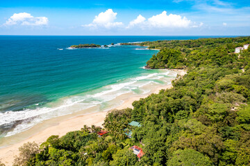 tropical island aerial view. wild coastline lush exotic green jungle. red frog beach in bastimentos 