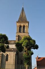 Wall Mural - Stone Church Tower & Spire seen from below against Blue Sky 