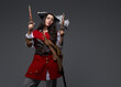 Brunette corsair with guns dressed in pirate outfit