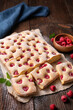 Raspberry cake known as Bublanina sprinkled with powdered sugar